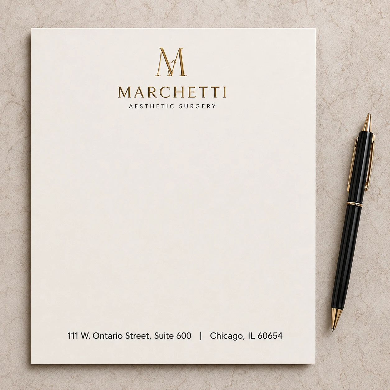 Gold monogram stationery